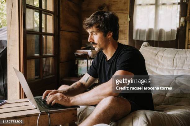 adult man teleworking with laptop - gentleman moustache stock pictures, royalty-free photos & images