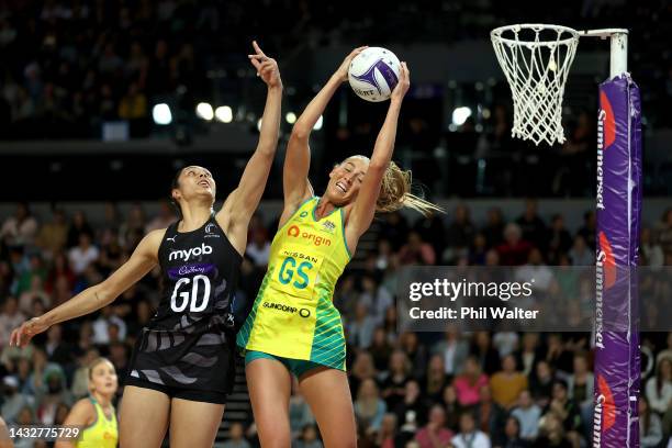 Cara Koenen of the Australian Diamonds and Phoneix Karaka of the Silver Ferns contest a pass during the Constellation Cup netball match between New...