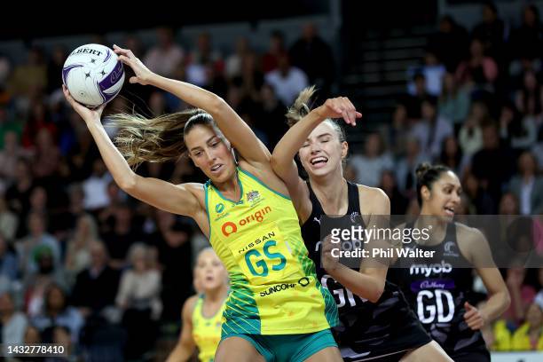 Cara Koenen of the Australian Diamonds and Kelly Jury of the Silver Ferns contest a pass during the Constellation Cup netball match between New...