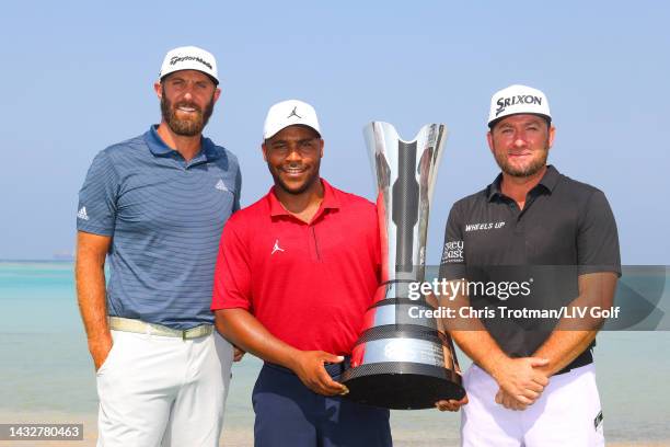 Team Captain Dustin Johnson of 4 Aces GC, Harold Varner III of Niblicks GC and Graeme McDowell of Cleeks GC pose with the Saudi International trophy...