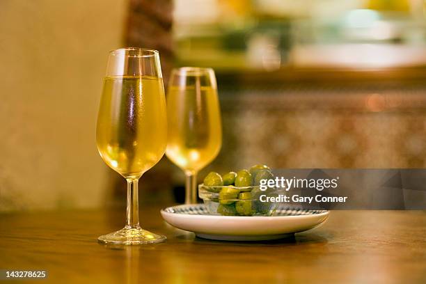 fino sherry and olives - sherry stock pictures, royalty-free photos & images