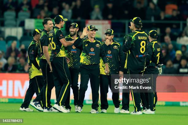 Adam Zampa of Australia celebrates catching Jos Buttler of England during game two of the T20 International series between Australia and England at...