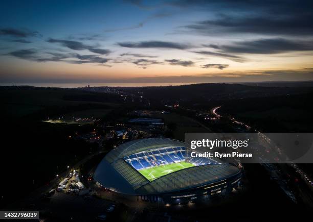 An aerial view at sunset of the American Express Community Stadium prior to the International Friendly on October 11, 2022 in Brighton, England.