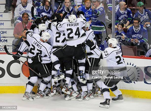 The Los Angeles Kings celebrate their OT victory over the Vancouver Canucks in Game Five of the Western Conference Quarterfinals during the 2012 NHL...