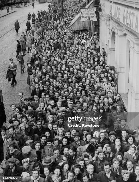 Section of the crowds that had gathered to buy tickets for American actor, comedian, singer and dancer Danny Kaye's tour date at the Manchester...