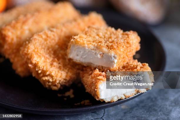 crispy vegan breaded fried tofu - cutlet stock pictures, royalty-free photos & images