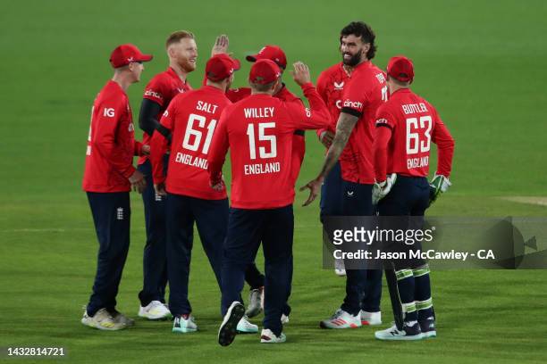 Reece Topley of England celebrates after taking the wicket of David Warner of Australia during game two of the T20 International series between...