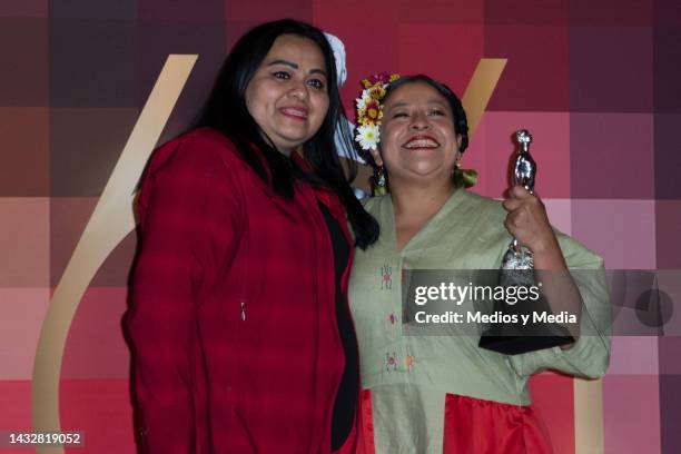 María Teresa Hernández Cañas and Mónica del Carmen pose for photo with Ariel Award in the Press Room after win in the 64th Ariel Award Ceremony, at...