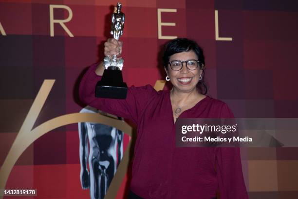 Tatiana Huezo poses for photo with Ariel Award in the Press Room after win in the 64th Ariel Award Ceremony, at Colegio de San Ildefonso, on October...