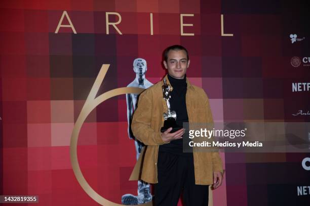Adrián Rossi poses for photo with Ariel Award in the Press Room after win in the 64th Ariel Award Ceremony, at Colegio de San Ildefonso, on October...