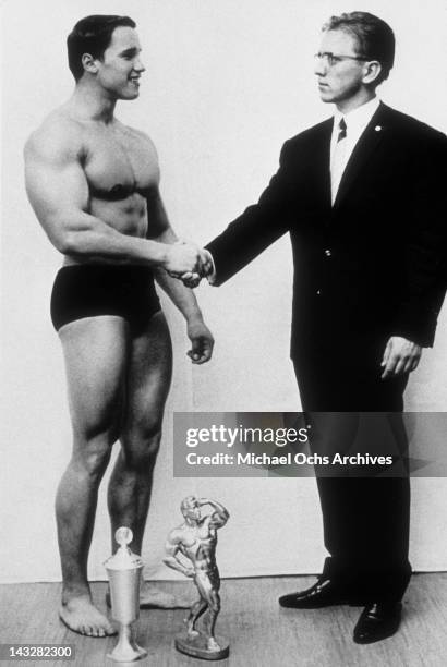 Young bodybuilder Arnold Schwarzenegger wins a competition circa 1966 in Austria.