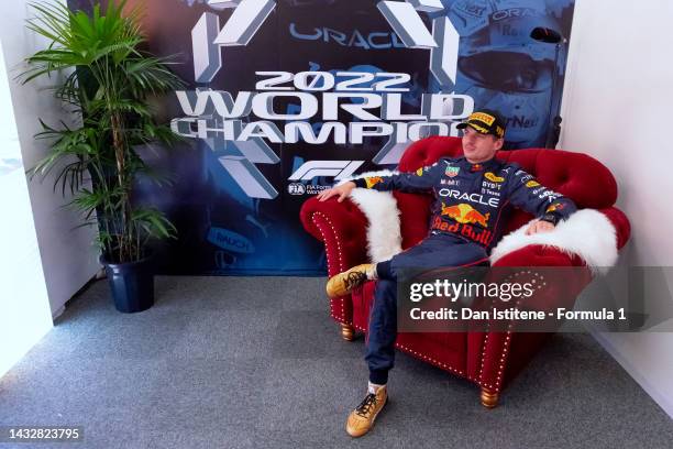 Race winner and 2022 F1 World Drivers Champion Max Verstappen of Netherlands and Oracle Red Bull Racing sits in the World Champion's cool down room...