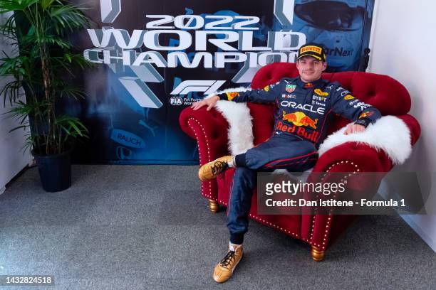 Race winner and 2022 F1 World Drivers Champion Max Verstappen of Netherlands and Oracle Red Bull Racing sits in the World Champion's cool down room...