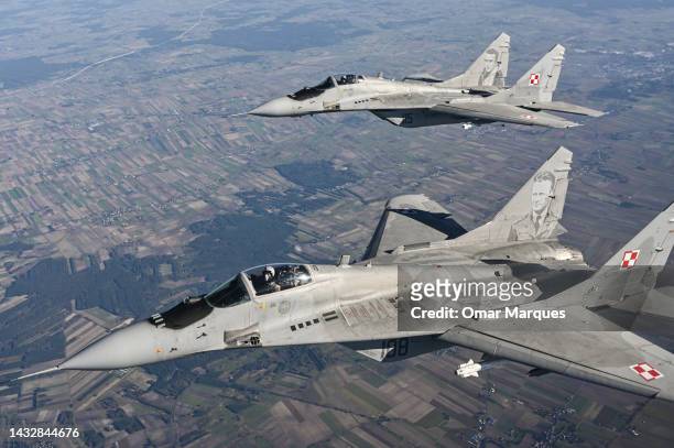 Mikoyan MIG-29 fighter jets of the Polish Air Force take part in a NATO shielding exercise at the Lask Air Base on October 12, 2022 in Lask, Poland....