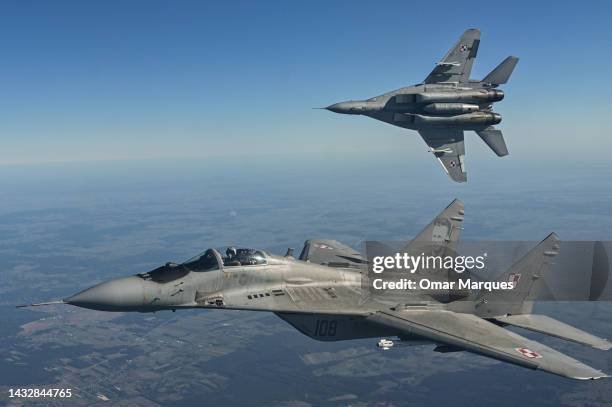 Mikoyan MIG-29 fighter jets of the Polish Air Force take part in a NATO shielding exercise at the Lask Air Base on October 12, 2022 in Lask, Poland....