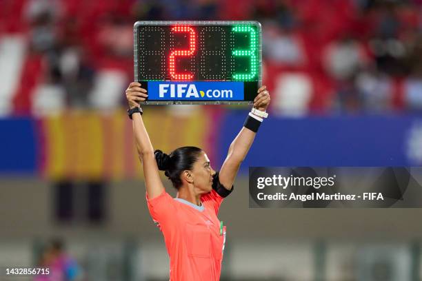 The assistant referee shows the substitute board during the FIFA U-17 Women's World Cup 2022 Group A match between India and USA at Kalinga Stadium...