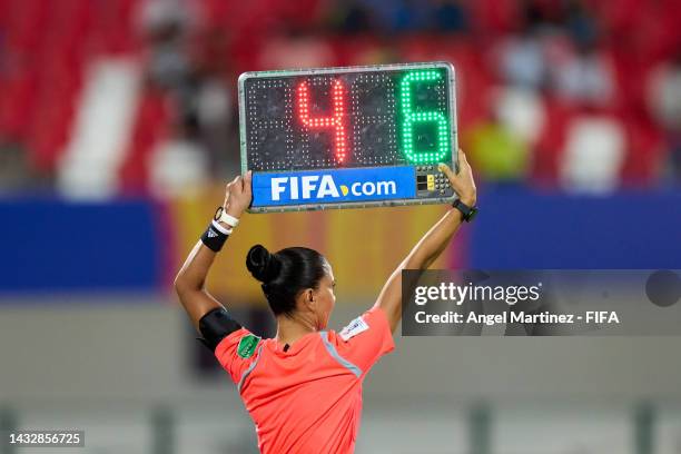 The assistant referee shows the substitute board during the FIFA U-17 Women's World Cup 2022 Group A match between India and USA at Kalinga Stadium...