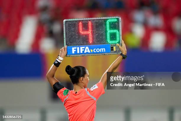 The assistant referee shows the substitute board during the FIFA U-17 Women's World Cup 2022 Group A match between India and USA at Kalinga Stadium...
