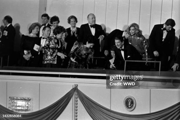 Jerry Zipkin , Lynn Wyatt , Princess Caroline of Monaco , and Ronald Reagan attend a reading of Ogden Nash verses, set to the music of Camile...