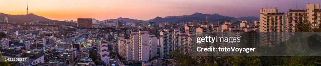 Seoul apartment buildings overlooking Namsan Tower skyscrapers downtown panorama Korea