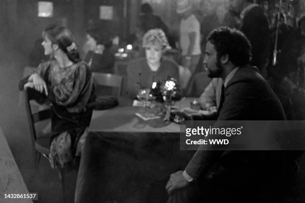 Nastassja Kinski, Cassie Yates, and Albert Brooks await filming during production of "Unfaithfully Yours" at 20th Century-Fox Studios in Century...