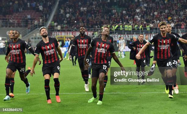 Players of AC Milan celebrate the victory with his teammate Rafael Leao after the Serie A match between AC MIlan and Juventus at Stadio Giuseppe...