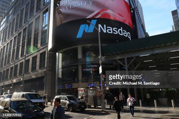 The Nasdaq MarketSite is seen on October 12, 2022 in New York City. The Nasdaq Composite Index yesterday hit its lowest level since July, slipping...