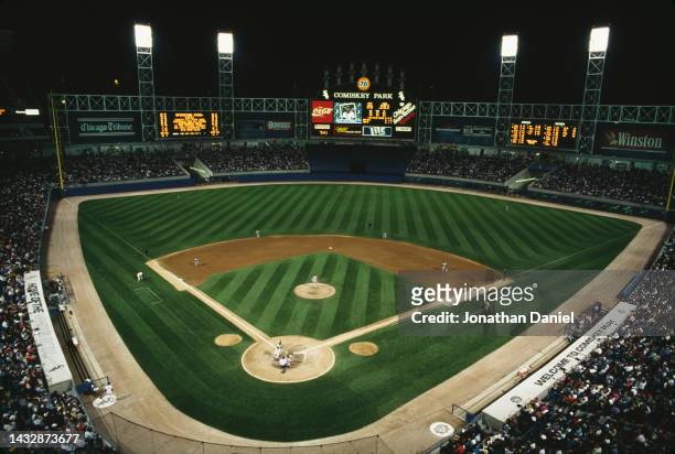 General view of fans and spectators of the Chicago White Sox watching the Major League Baseball American League West night game at the new Comiskey...