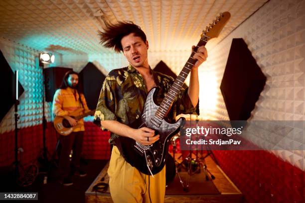 band having rehearsal at the music studio - cool guitar stock pictures, royalty-free photos & images