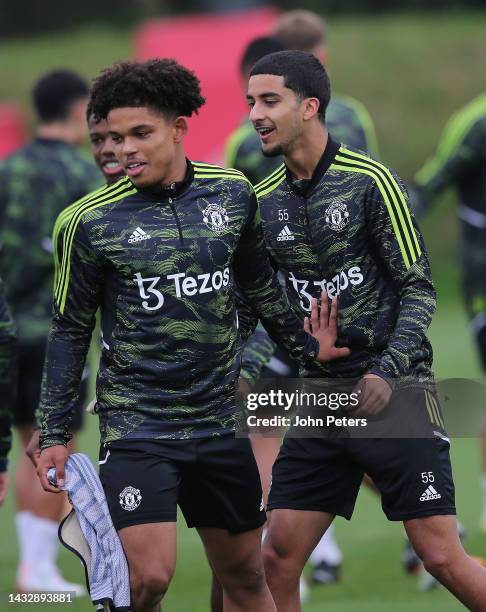 Shola Shoretire, Zidane Iqbal of Manchester United in action during a first team training session at Carrington Training Ground on October 12, 2022...