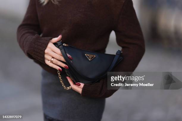 Sonia Lyson is seen wearing a total Prada look and a Prada Triangle Symbole bag, on October 07, 2022 in Berlin, Germany.