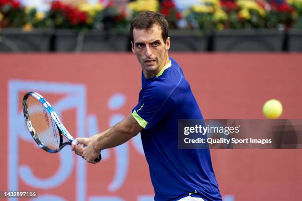 Albert Ramos-Vinolas of Spain looks to return a ball against Marcos Giron of the United States during first round on day two of the Gijon Open ATP...