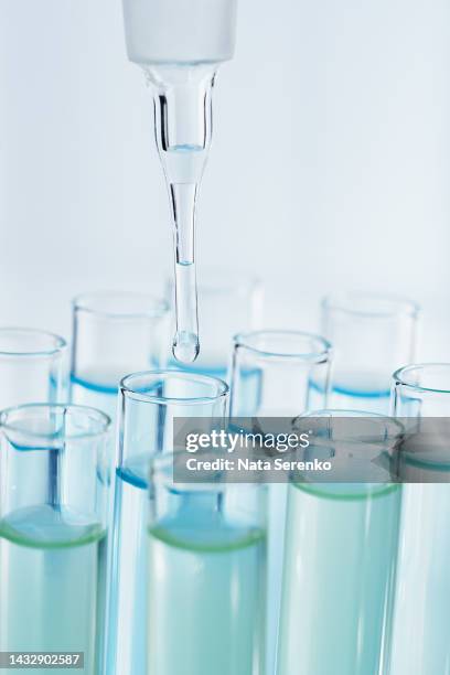 Lab Drippers Laboratory Glassware With Dropper Dripping Liquid Into Test Tube With ...