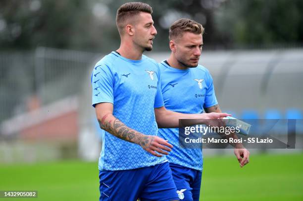 Sergej Milinkovic Savic and Ciro Immobile of SS Lazio during the training session at the Formello sport centre on October 12, 2022 in Rome, Italy.