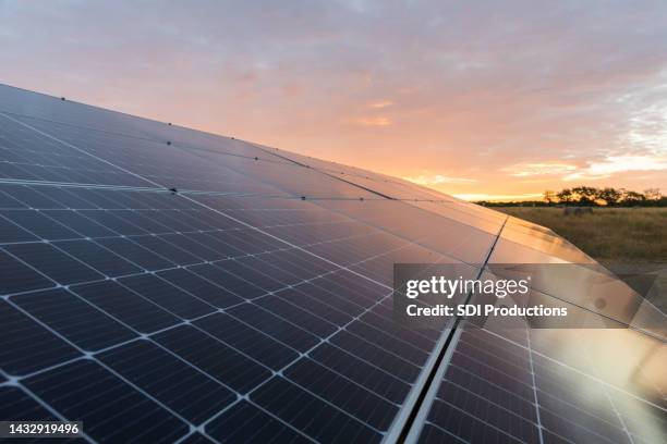 abstract view of solar panel - solar panels sunset stock pictures, royalty-free photos & images