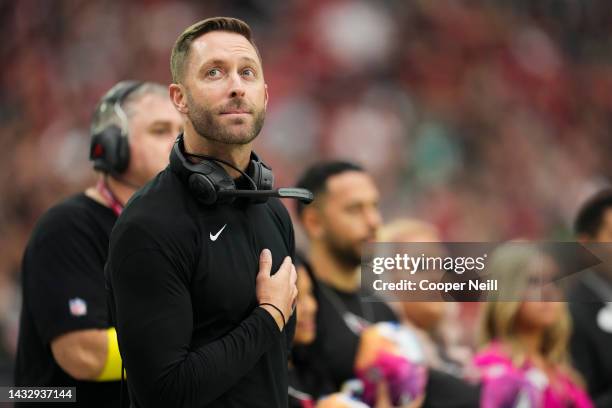 Head coach Kliff Kingsbury of the Arizona Cardinals stands during the national anthem against the Philadelphia Eagles at State Farm Stadium on...