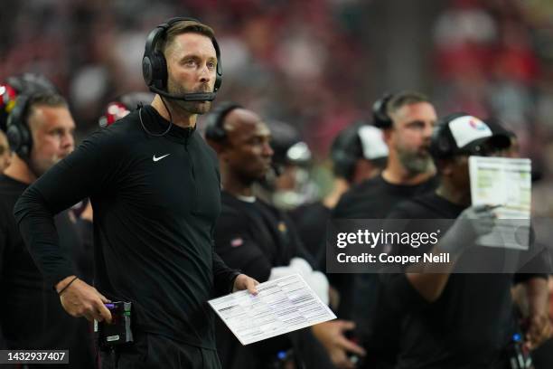 Head coach Kliff Kingsbury of the Arizona Cardinals looks down field against the Philadelphia Eagles at State Farm Stadium on October 9, 2022 in...