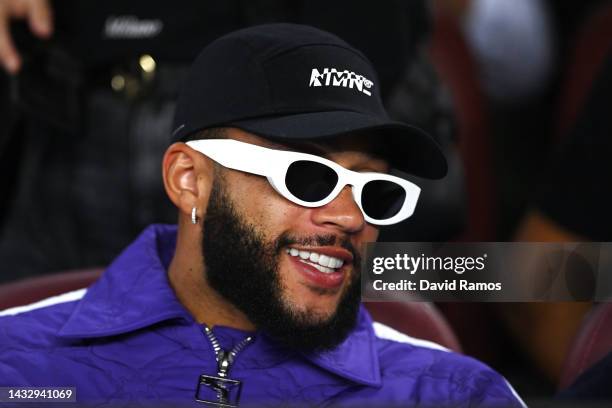 Memphis Depay of FC Barcelona looks on from the stands prior to the UEFA Champions League group C match between FC Barcelona and FC Internazionale at...