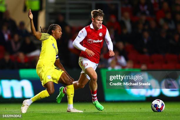 Alex Scott of Bristol City is challenged by Daniel Johnson of Preston North End during the Sky Bet Championship between Bristol City and Preston...