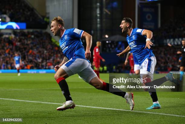 Scott Arfield of Rangers FC celebrates with Antonio Colak after scoring the opening goal during the UEFA Champions League group A match between...