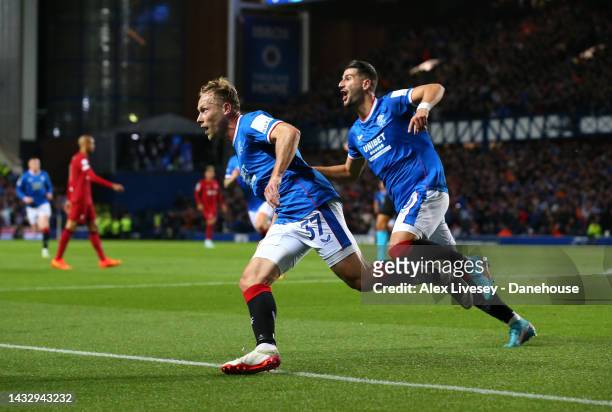 Scott Arfield of Rangers FC celebrates with Antonio Colak after scoring the opening goal during the UEFA Champions League group A match between...