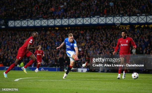 Scott Arfield of Rangers FC scores the opening goal during the UEFA Champions League group A match between Rangers FC and Liverpool FC at Ibrox...