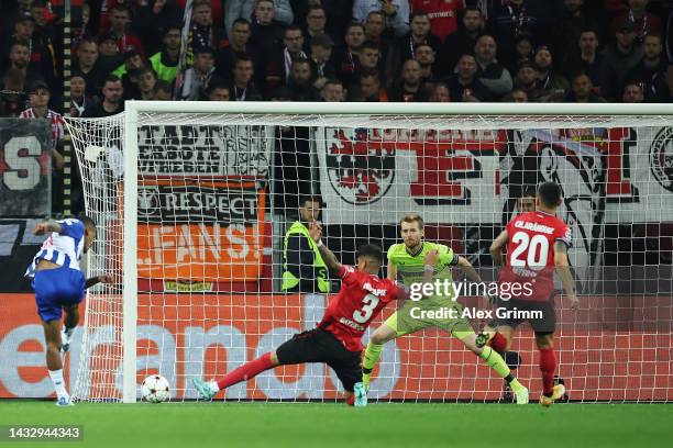 Lukas Hradecky of Bayer Leverkusen fails to stop a goal scored by Galeno of FC Porto for their side's first during the UEFA Champions League group B...