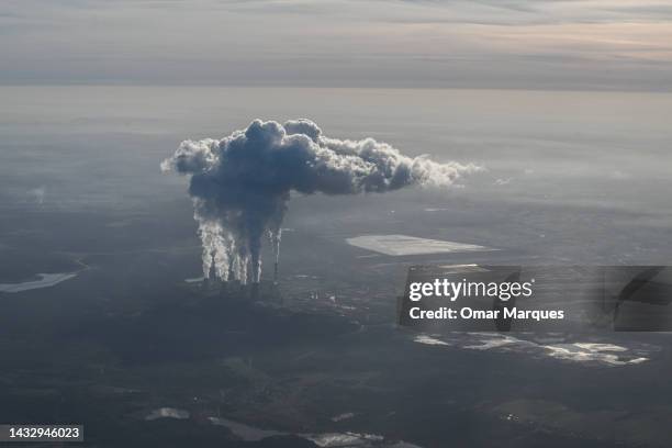 Steam and smoke rises from the Belchatow Coal Powered Station, as seen from an aircraft on October 12, 2022 in Belchatow, Poland. The Belchatow...