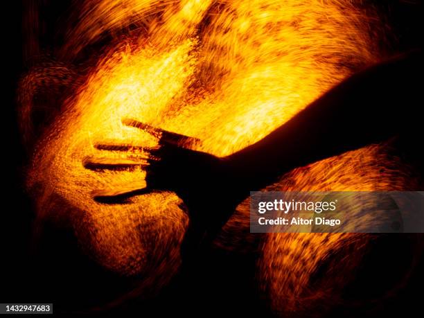 human hand in movement with mysterious background. halloween creative image. - condemned stock pictures, royalty-free photos & images