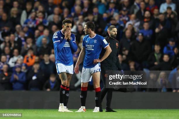 Connor Goldson of Rangers reacts after receiving an injury during the UEFA Champions League group A match between Rangers FC and Liverpool FC at...