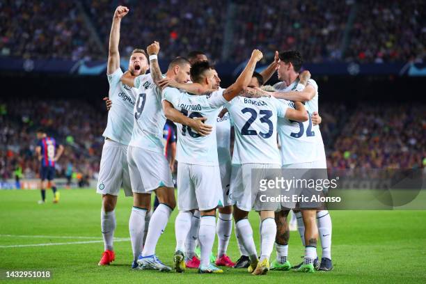 Nicolo Barella of FC Internazionale celebrates with teammates after scoring their team's first goal during the UEFA Champions League group C match...