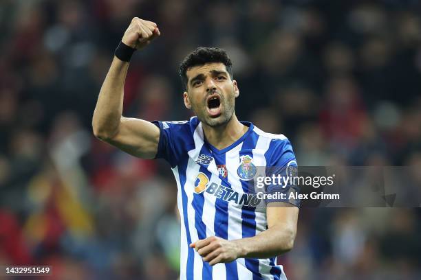 Mehdi Taremi of FC Porto celebrates after scoring their team's second goal from the penalty spot during the UEFA Champions League group B match...