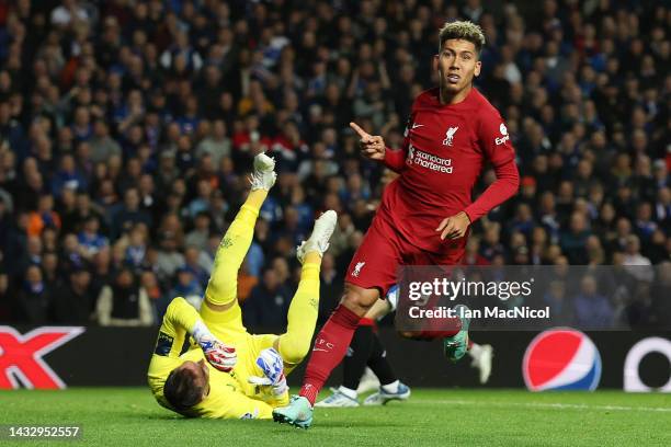 Roberto Firmino of Liverpool celebrates after scoring their team's second goal during the UEFA Champions League group A match between Rangers FC and...