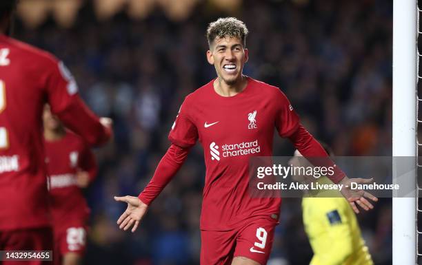 Roberto Firmino of Liverpool FC celebrates after scoring their second goal during the UEFA Champions League group A match between Rangers FC and...